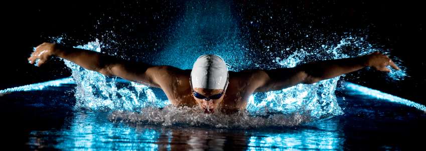 Male swimmer doing butterfly